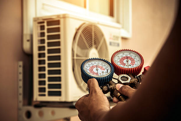 Professional Hvac technician working in Morrisonville, NY